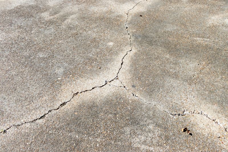 What Causes Concrete Cracks, Spalling, And Surface Damage